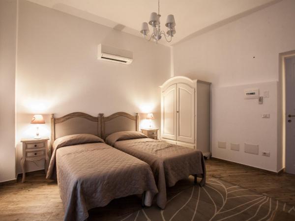 City Garden Guest House : photo 5 de la chambre chambre lits jumeaux pour personnes à mobilité réduite