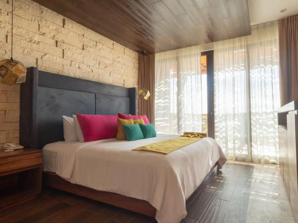 Hotel Beló Isla Mujeres - All Inclusive : photo 2 de la chambre suite deluxe lit king-size belo - réservée aux adultes