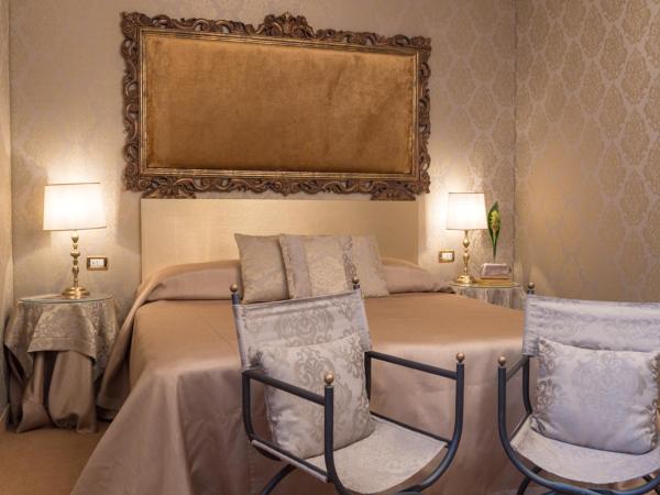 Hotel Metropole Venezia : photo 1 de la chambre chambre classique avec vue sur le jardin