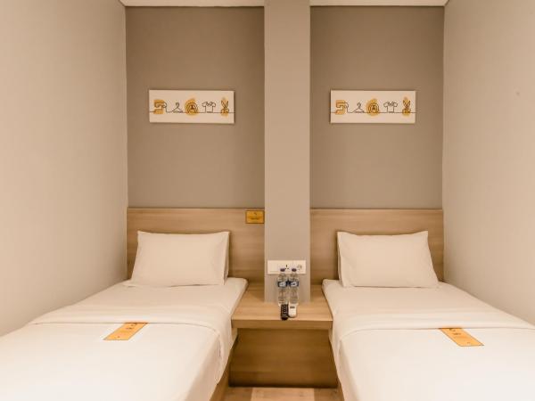 Yellow Bee Tanah Abang : photo 4 de la chambre chambre lits jumeaux standard