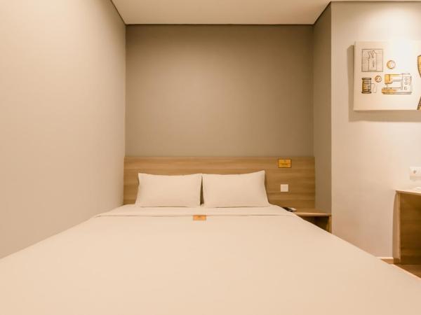 Yellow Bee Tanah Abang : photo 9 de la chambre chambre lit king-size deluxe