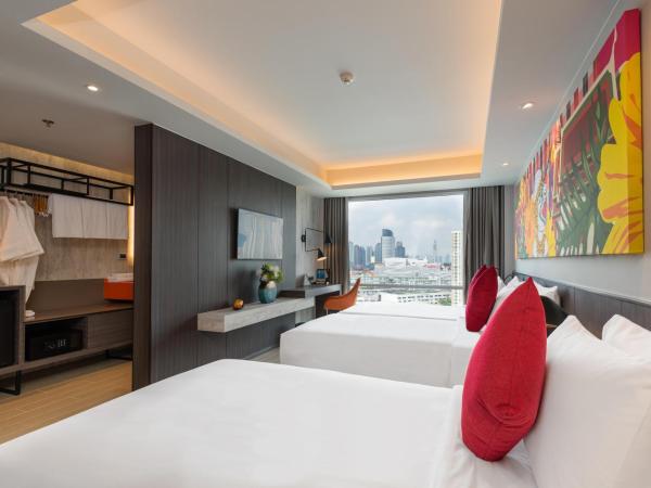 Maitria Hotel Rama 9 Bangkok - A Chatrium Collection : photo 3 de la chambre hébergement triple premier - vue sur jardin