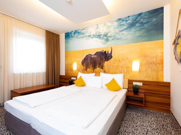 Hotel Süd Graz : photo 2 de la chambre chambre double - bâtiment attenant