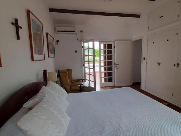 Dos Balcones : photo 3 de la chambre chambre lit queen-size avec salle de bains commune