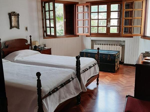 Dos Balcones : photo 1 de la chambre chambre lits jumeaux avec salle de bains privative