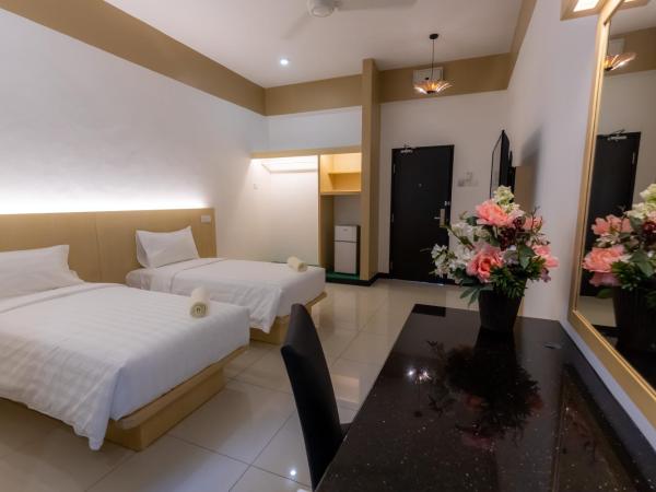 Scott Service Suites : photo 3 de la chambre chambre lits jumeaux standard