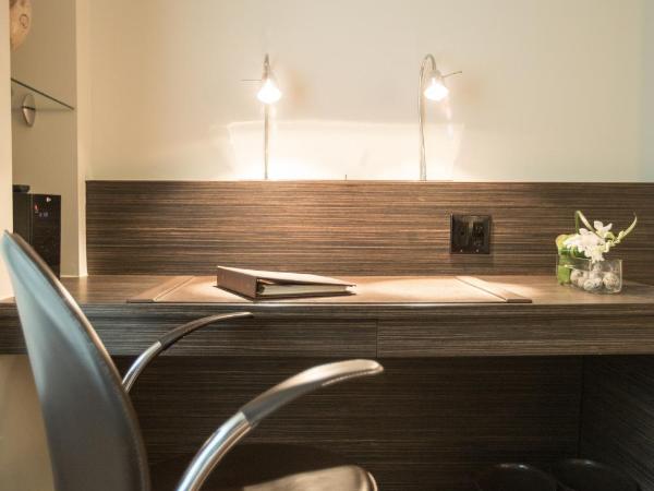 Hôtel Le Bonne Entente : photo 6 de la chambre hébergement lit king-size terzo