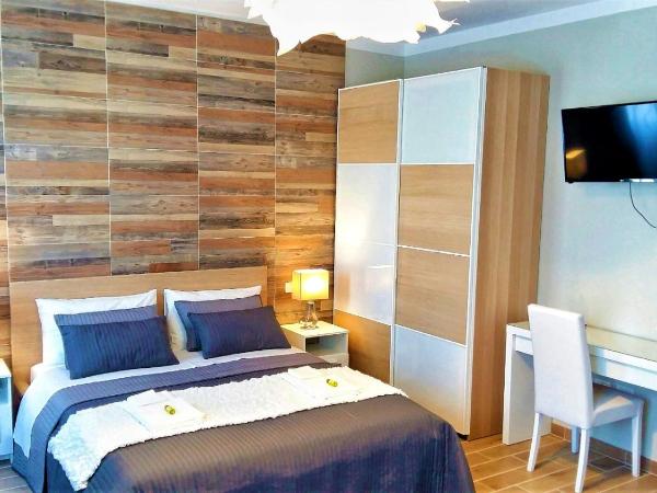 Pisa City Lodge : photo 2 de la chambre chambre triple avec salle de bains privative