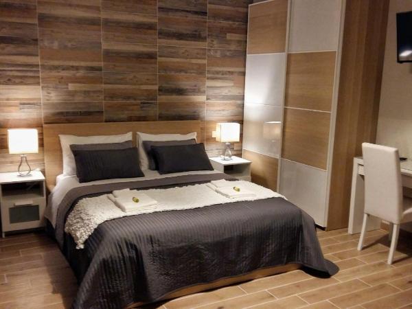 Pisa City Lodge : photo 3 de la chambre chambre triple avec salle de bains privative