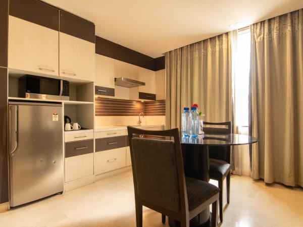 Halcyon Hotel Residences Koramangala - Bangalore : photo 7 de la chambre appartement 1 chambre avec cuisine