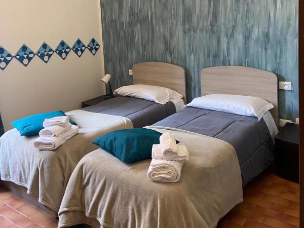 ALBERGO 900Strati : photo 1 de la chambre chambre lits jumeaux