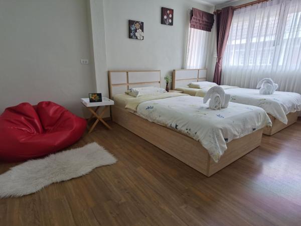 TD Bangkok : photo 1 de la chambre chambre lits jumeaux avec salle de bains