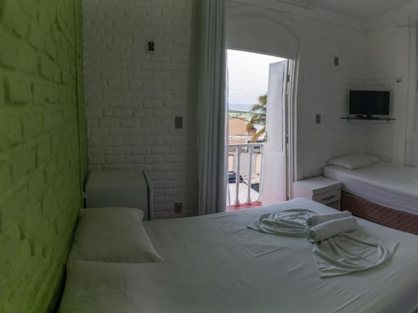 Pousada Nossa Natal : photo 5 de la chambre chambre triple avec balcon