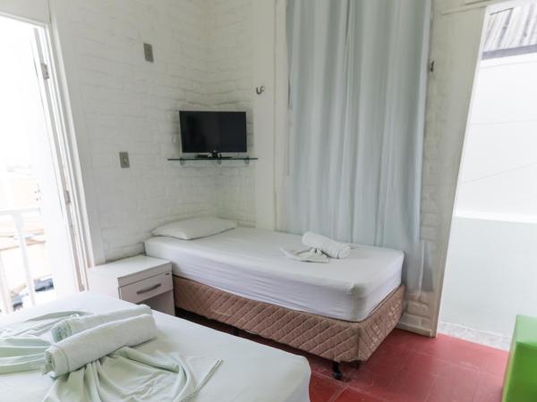 Pousada Nossa Natal : photo 6 de la chambre chambre triple avec balcon