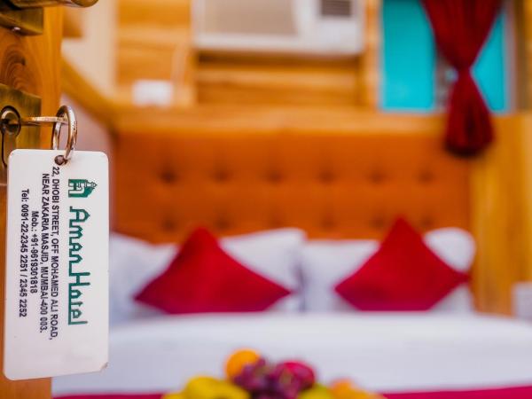 Aman Hotel near CST : photo 6 de la chambre five bed ac