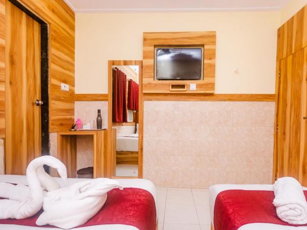 Aman Hotel near CST : photo 2 de la chambre triple bed ac