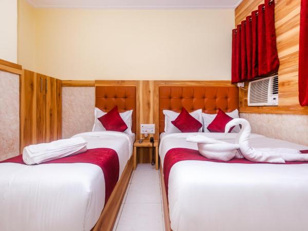 Aman Hotel near CST : photo 6 de la chambre triple bed ac