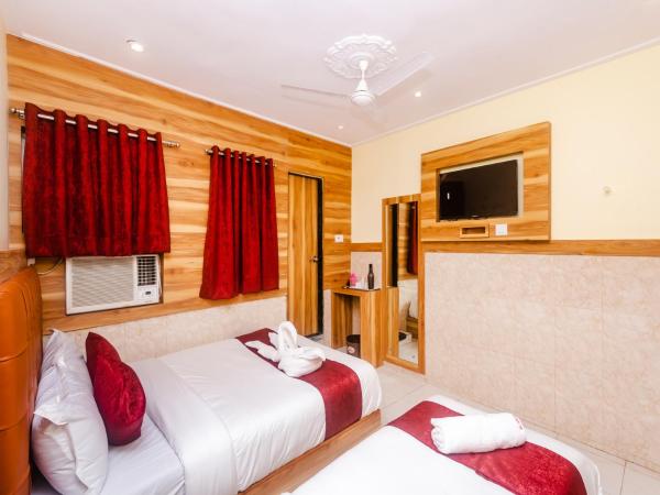 Aman Hotel near CST : photo 3 de la chambre triple bed ac