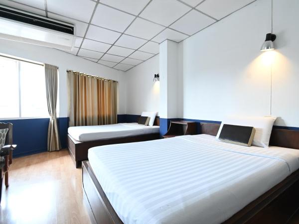 The Krungkasem Srikrung Hotel : photo 1 de la chambre chambre triple