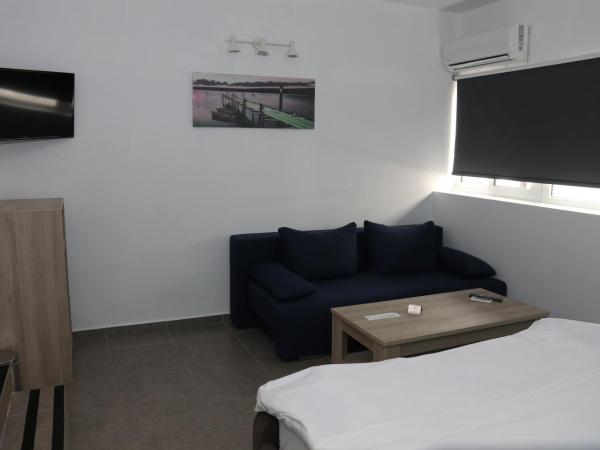 Luxor Premium Suites : photo 1 de la chambre chambre triple standard