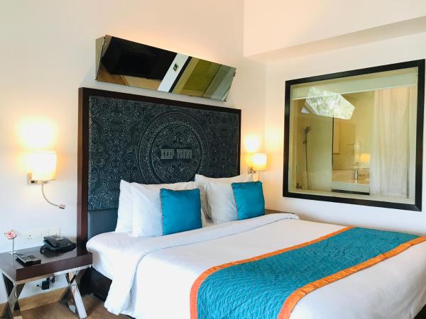 Golden Tulip Gurgaon Sector 29 : photo 7 de la chambre deluxe room 1 queen bed garden view