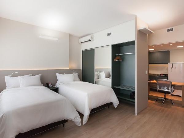 eSuites Virgínia Luxemburgo : photo 5 de la chambre suite lits jumeaux - 2 lits simples