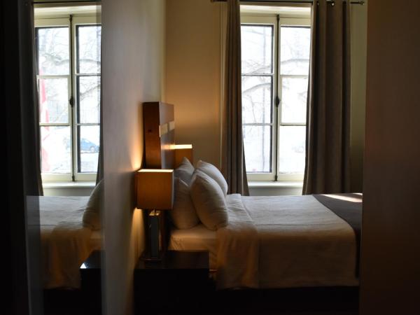 Hôtel Sainte-Anne : photo 1 de la chambre chambre lit queen-size deluxe