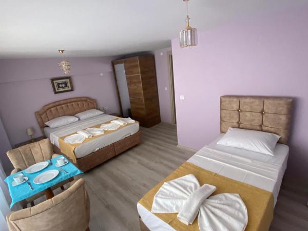 Garden House : photo 10 de la chambre chambre triple confort avec douche