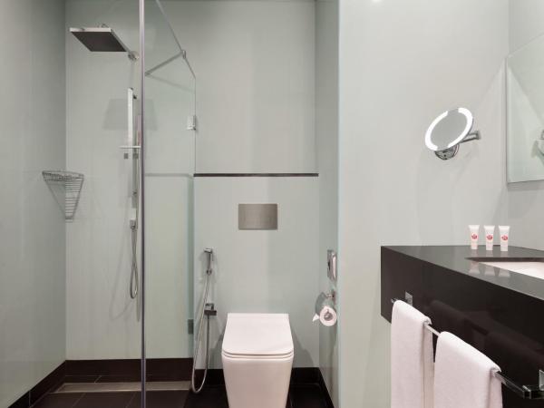 Ramada Encore by Wyndham Muscat Al-Ghubra : photo 1 de la chambre chambre lit king-size deluxe