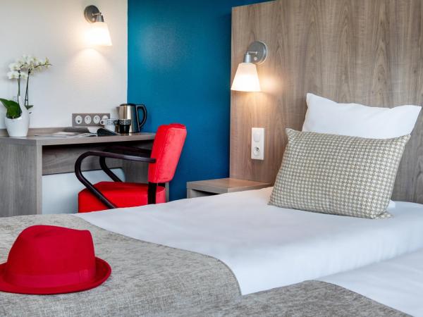 Hôtel Panorama : photo 4 de la chambre chambre lits jumeaux avec balcon