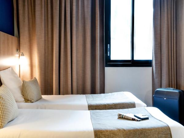 Hôtel Panorama : photo 3 de la chambre chambre lits jumeaux avec balcon