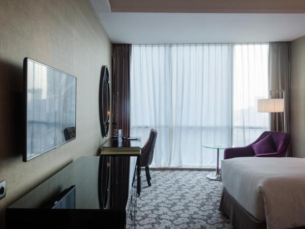 Hotel Ciputra World Surabaya managed by Swiss-Belhotel International : photo 6 de la chambre chambre double deluxe