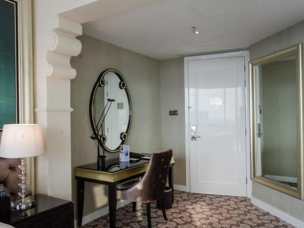 Hotel Ciputra World Surabaya managed by Swiss-Belhotel International : photo 5 de la chambre grande chambre double deluxe