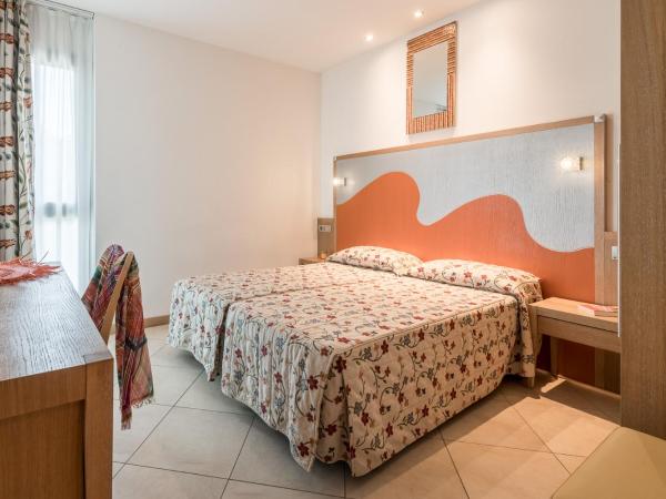 Hotel Katja : photo 3 de la chambre chambre lits jumeaux pour personnes à mobilité réduite