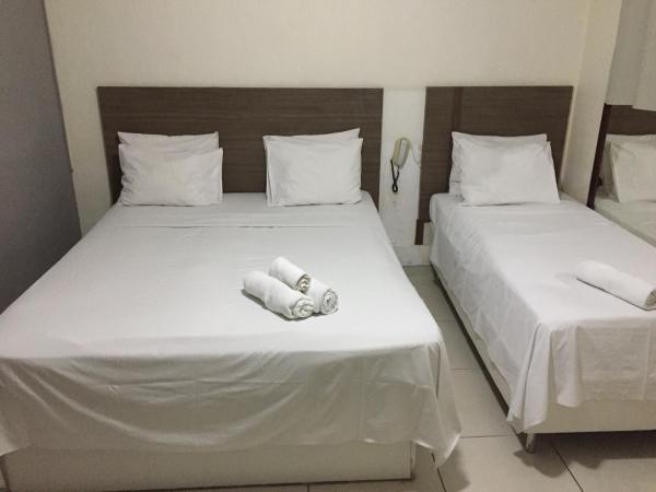 Novo Hotel Barro Preto : photo 4 de la chambre chambre triple