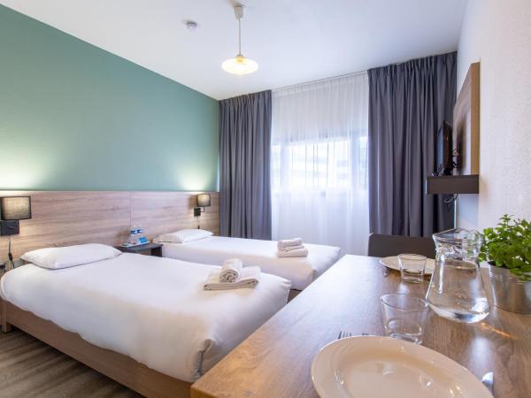 Zenitude Hôtel-Résidences Le Mans Novaxis : photo 1 de la chambre studio lits jumeaux