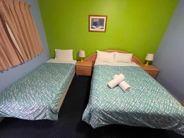 City East Motel : photo 9 de la chambre chambre lits jumeaux