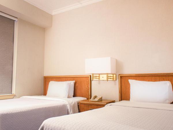 Travohotel Monterrey Histórico : photo 4 de la chambre chambre double avec 2 lits doubles