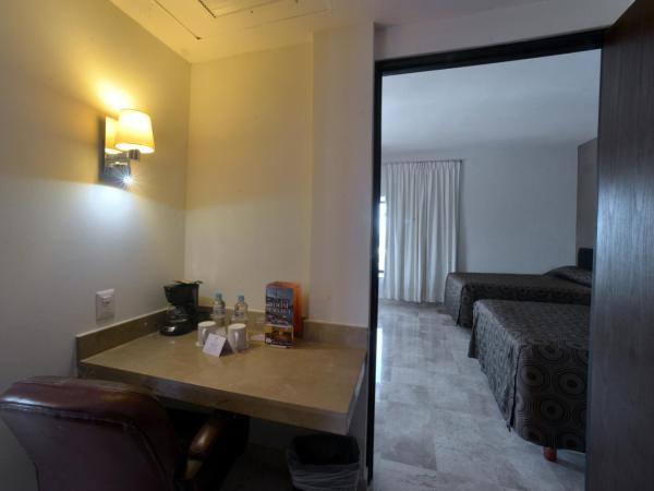 Hotel Mar y Tierra : photo 2 de la chambre chambre triple avec 3 lits doubles 
