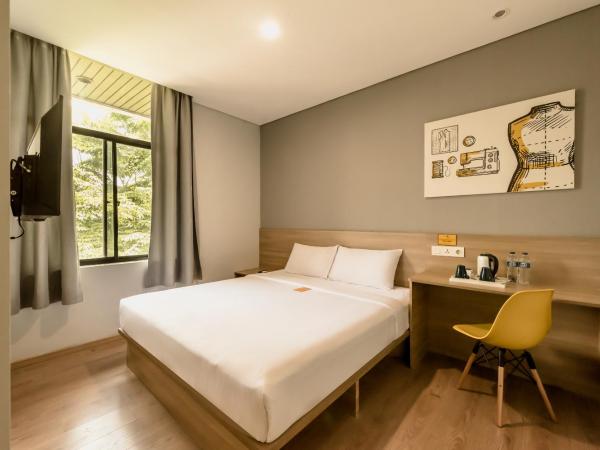 Yellow Bee Tanah Abang : photo 3 de la chambre chambre lit king-size deluxe