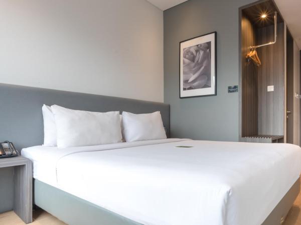 Juno Tanah Abang Jakarta : photo 7 de la chambre chambre lit queen-size deluxe