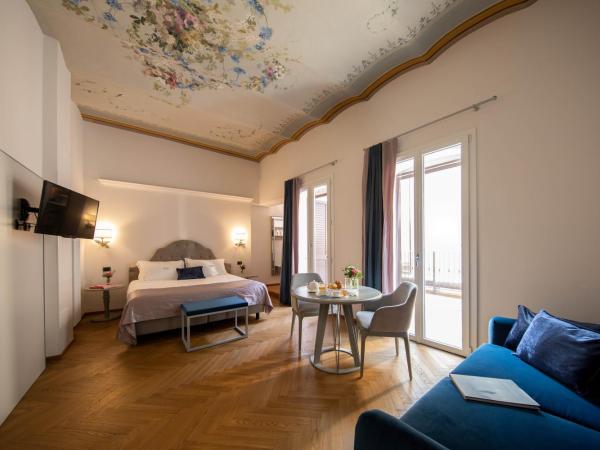 Hotel Touring : photo 1 de la chambre suite junior - vue sur jardin