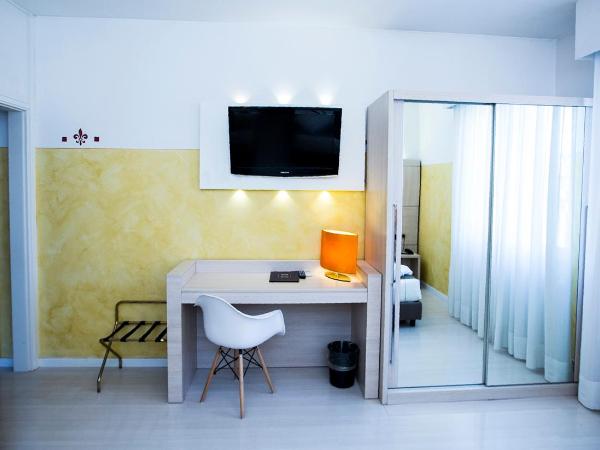 Agape Hotel AA Hotels : photo 7 de la chambre chambre triple