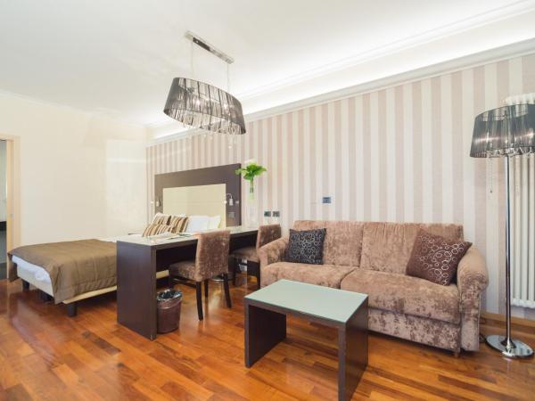 Hotel Touring : photo 7 de la chambre suite junior avec terrasse