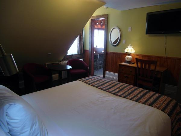 Hôtel Manoir de l'Esplanade : photo 6 de la chambre chambre lit queen-size deluxe