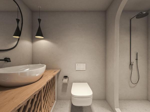 Oia Memories Suites : photo 2 de la chambre suite de luxe avec vue sur la caldeira