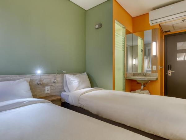 ibis budget BH Savassi : photo 1 de la chambre chambre lits jumeaux standard