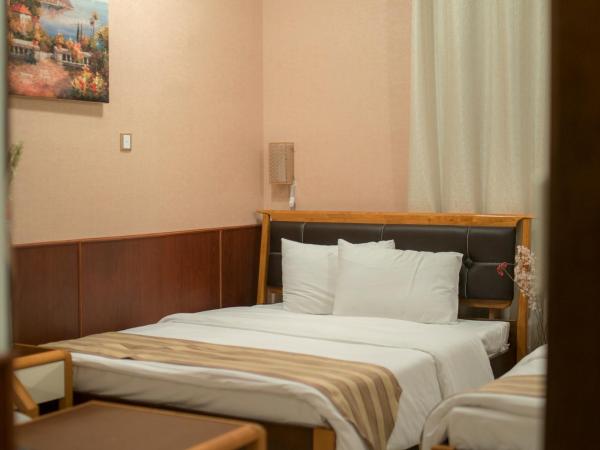 Al Ghubrah Plaza Hotel : photo 7 de la chambre chambre lits jumeaux deluxe