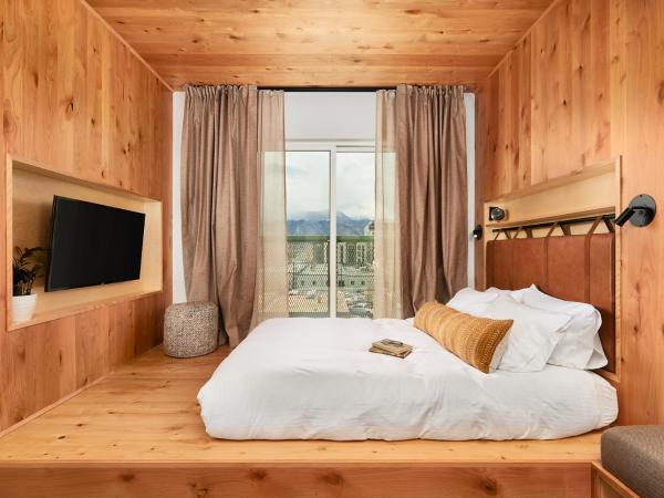 Kinship Landing : photo 1 de la chambre suite lit queen-size junior montagne