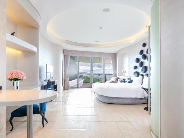 Sanya Phoenix Island Yuejia flat : photo 6 de la chambre chambre lit king-size deluxe - vue sur mer